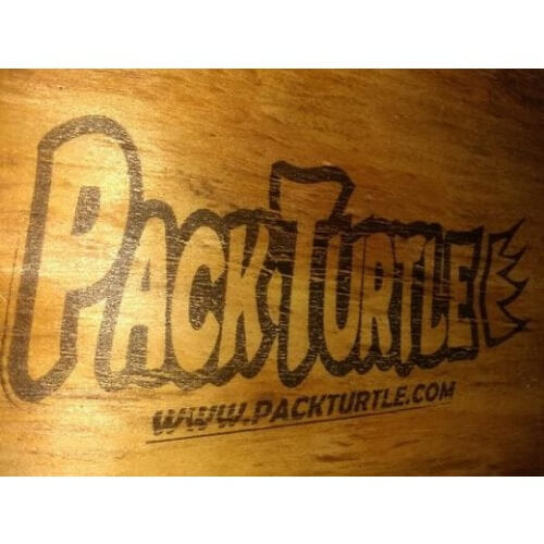 Pack Turtle Logo stamped on wood with www.packturtle.com