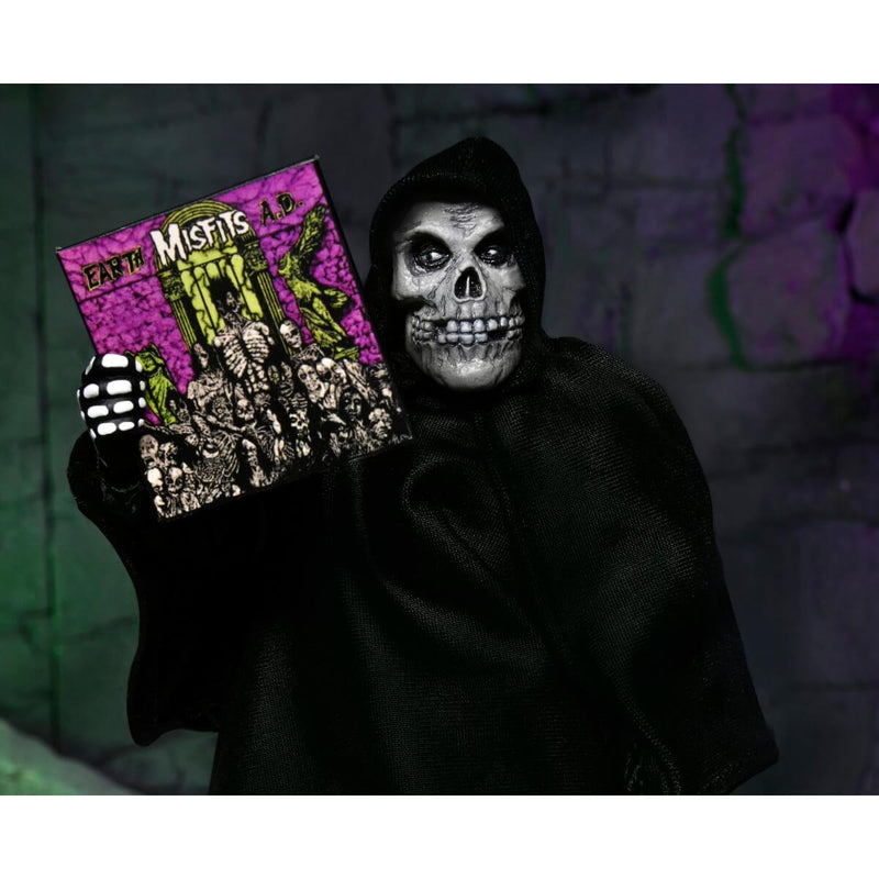 NECA The Misfits Ultimate Fiend 7-Inch Scale Action Figure, holding Earth AD Album