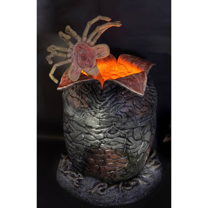 NECA Life-sized Light-Up Alien Xenomorph Egg with Facehugger, showing LED function with facehugger inside