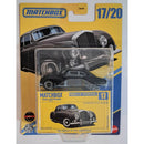 Matchbox toy car packaging with a vintage car model on a yellow background
