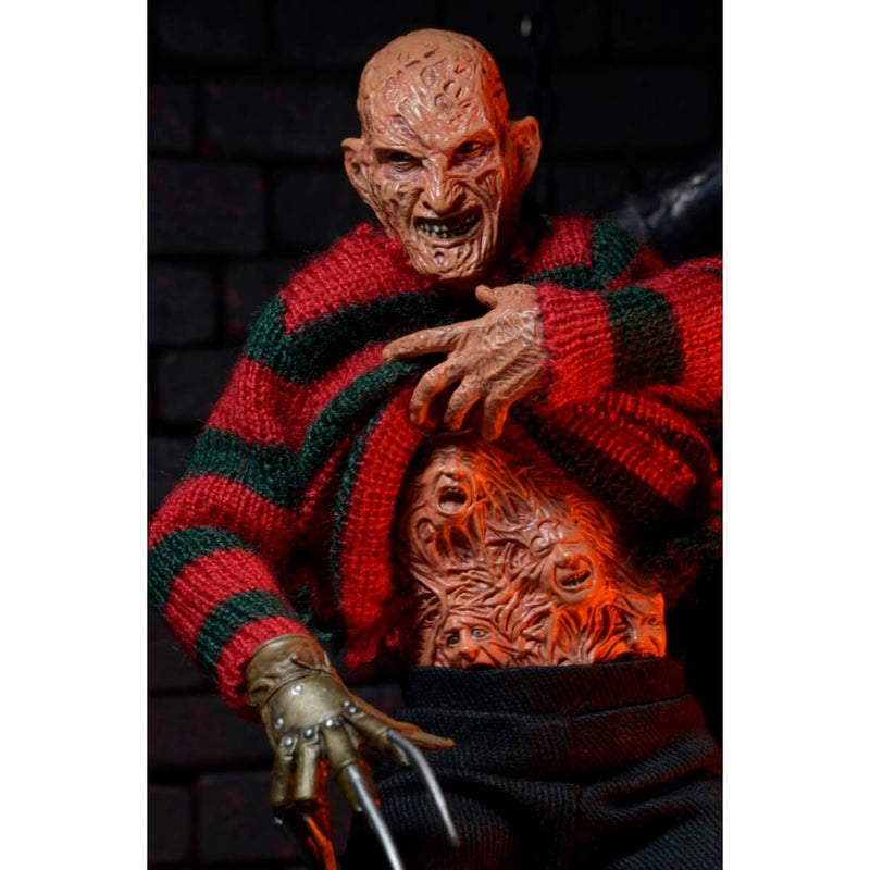 Freddy Nightmare on Elm Street Dream Warriors - 8” Clothed NECA Figure, holding up shirt