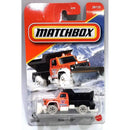 Matchbox Plowverizer die-cast toy truck in its original blister card packaging, featuring an orange and black snowplow truck with a snowy mountain backdrop.