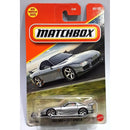 Matchbox 2002 Mazda RX-7 Spirit R die-cast toy car in its original blister card packaging, featuring a silver car with a red and orange Matchbox logo background.