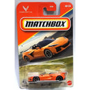Matchbox Corvette die-cast toy car in its original blister card packaging, featuring an orange sports car on a red and yellow branded backing card.