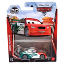 Disney Pixar Cars Memo Rojas Jr. die-cast metal toy car in its original blister card packaging, featuring a red, white, and green race car design.