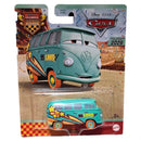 Disney Pixar Cars All Movie 2026 1/6 scale die-cast toy car in its original blister card packaging. The toy is a turquoise Volkswagen-style van with orange wheels and yellow/orange star and lightning graphic decals.