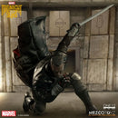 Marvel's Midnight Suns One:12 scale collectible figure of Black Panther in a dynamic crouching pose, holding a sword, set against a stone wall background. Brand logos for Marvel, Midnight Suns, Mezco Toyz, and Top Collectibles are visible.