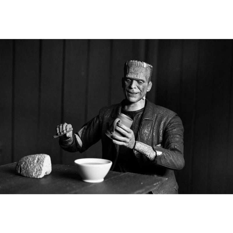 Ultimate Frankenstein's Monster (B&W) - from Bride of Frankenstein 7" Scale NECA Action Figure, sitting figure with cup, bowl, and bread accessories