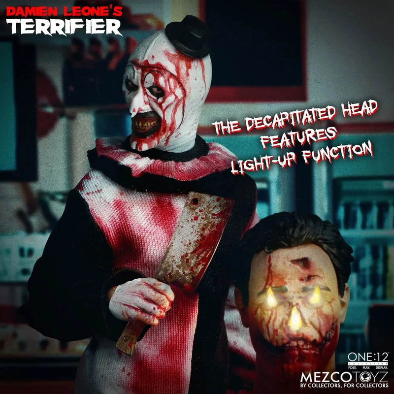 Terrifier Art the Clown Deluxe One:12 Collective Action Figure - Mezco Toyz, figure holding head and clever