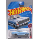 Hot Wheels Compact Kings '63 Chevy II die-cast toy car in its original blister card packaging.