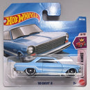 A Hot Wheels '63 Chevy II die-cast toy car in its original blister packaging, featuring a light blue car with a white hood and black wheels, on a gray background.
