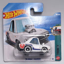 Hot Wheels Tooned '70 Dodge Charger die-cast toy car in its original blister card packaging, featuring a white car with blue and red stripes and a supercharger detail.