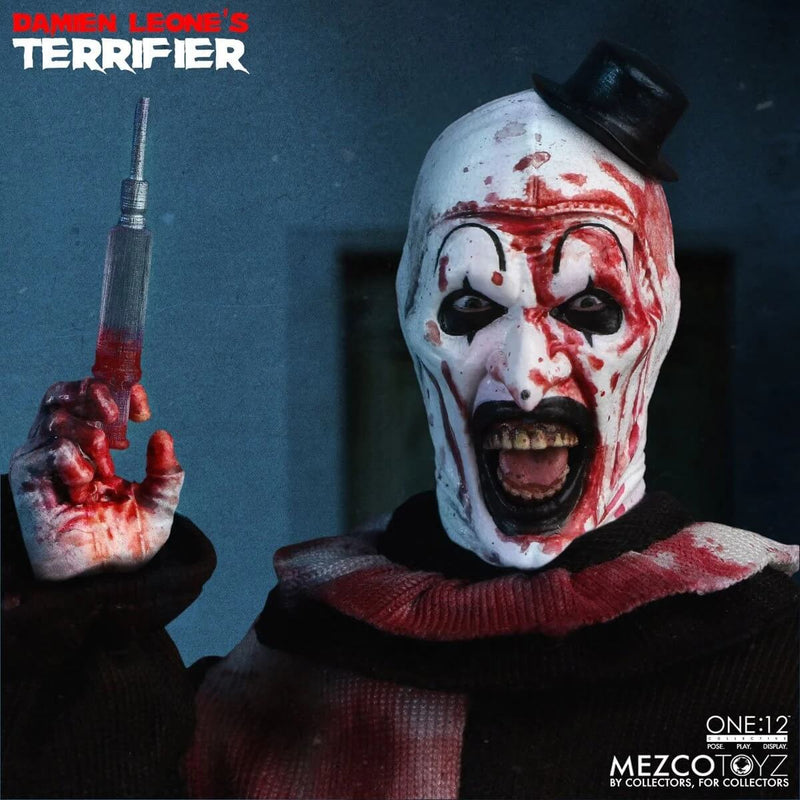 Terrifier Art the Clown Deluxe One:12 Collective Action Figure - Mezco Toyz, closeup of figure holding syringe