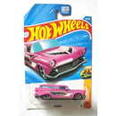 A Hot Wheels die-cast toy car in its original blister card packaging, featuring a pink 1957 Chevy station wagon named '8 Crate'.