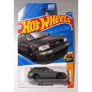 A Hot Wheels die-cast toy car of a '94 Audi Avant RS2 wagon, mounted on its original blue and red blister card packaging.