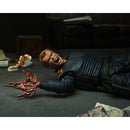 Alex Murphy (Robocop, OCP Uniform) Ultimate 7" Scale NECA Action Figure, showing battled damaged hand