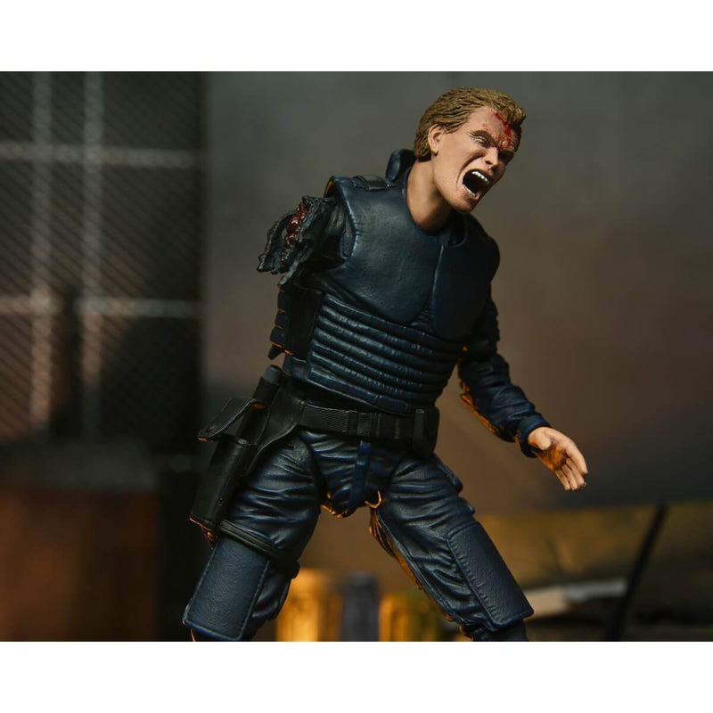 Alex Murphy (Robocop, OCP Uniform) Ultimate 7" Scale NECA Action Figure, showing battle damaged arm