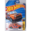 Hot Wheels '67 Austin Mini Van toy car in packaging with Hot Wheels logo.