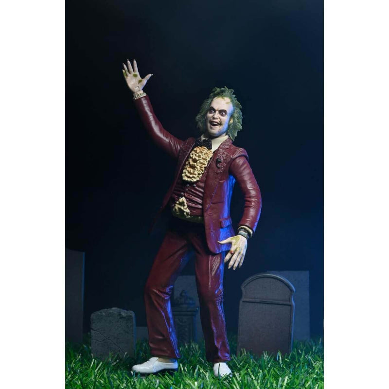 Beetlejuice (1988) - Red Suit 7-Inch Scale NECA Action Figure in Blister Packaging, figure in graveyard diorama