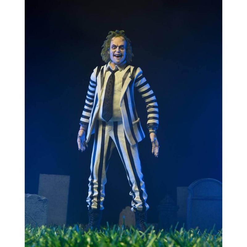 Beetlejuice (1988) - Striped Suit 7-Inch Scale NECA Action Figure in Blister Packaging, figure in graveyard diorama