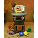 NECA Dinosaurs Ultimate Baby Sinclair 7-Inch Scale Action Figure, unpackaged sitting in baby chair