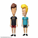 Two animated character action figures wearing t-shirts with text on a white background.