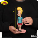9-inch Beavis action figure held in hands against a black background