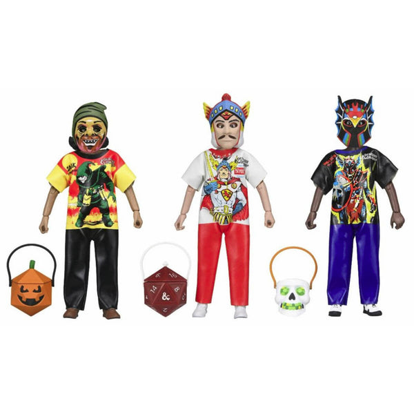 Three colorful action figures with Halloween-themed accessories on a white background