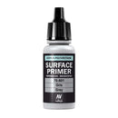 Bottle of Surface Primer with black cap on a white background