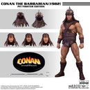 Conan the Barbarian action figure with interchangeable heads and Mezco Toyz branding.
