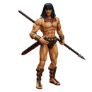 Muscular action figure with weapons on a white background