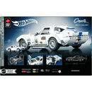 Brick Shop Hot Wheels Corvette Grand Sport 1:16 Scale Die-Cast Car, displaying the back of the package which shows the doors open and the hood opening as well and you see that you get a 1:64 scale car along with the 1:16 scale Grand Sport
