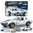 Brick Shop Hot Wheels Corvette Grand Sport 1:16 Scale Die-Cast Car, Displaying 1:16 scale corvette grand sport and exclusive matching metal 1:64 scale car outside of the package with the package pictured in the background