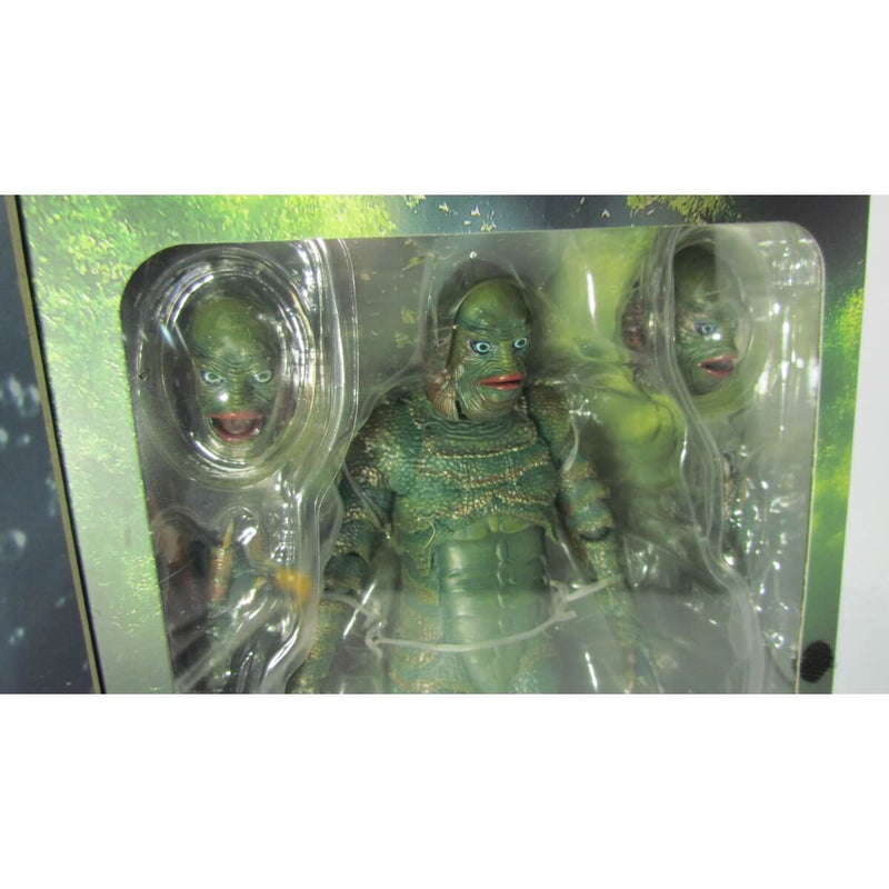 NECA Universal Monsters Ultimate Creature from the Black Lagoon (Color) 7-Inch Scale Action Figure, closeup of figure in package