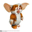 Gremlins 2: The New Batch Daffy Mogwai Prop Replica, standing with arms straight down to side and silly grin on face