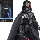 Darth Vader action figure from Star Wars with packaging in the background