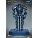 Pacific Rim Gipsy Danger 6.5 inch DeGoStyle collectible figure on a display stand, featuring metallic blue armor with orange and white markings, set against a dark gray studio background.