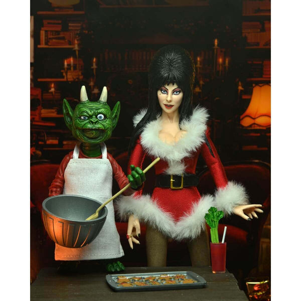 NECA Elvira's Very Scary Xmas 8-Inch Clothed Action Figure, unpackaged standing at table