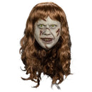 Halloween mask with long brown hair on a white background