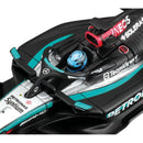 Close-up of a Formula 1 car cockpit with visible branding on a white background