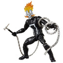 Action figure with black and white costume, flame-like hair, and weapons on a white background