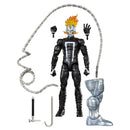 Action figure with black and white suit, flaming hair, and accessories on a white background