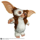 Gremlins 2: The New Batch Gizmo Mogwai Prop Replica, standing to the side with right arm/hand up and left arm/hand down