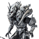 Detailed Godzilla-like creature with armor and red eyes on a white background