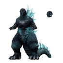 Godzilla figure with blue energy effects on a white background
