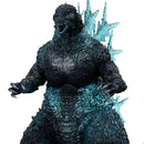 Godzilla toy figure with blue energy effects on a white background
