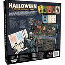 Halloween-themed board game box with characters and components on a dark background