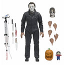 Halloween Resurrection Ultimate Michael Myers 7-Inch Scale Action Figure pictured with added accessories which include spare head, hands, weapons, and pumpkin with scary face