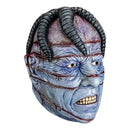 A horror-style severed head mask with blue-gray skin, exposed bone-like detailing, dark twisted horns, and red stitched wounds, shown on a plain white background.