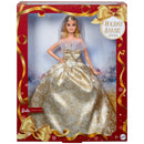 Holiday Barbie doll in a gold dress with decorative packaging